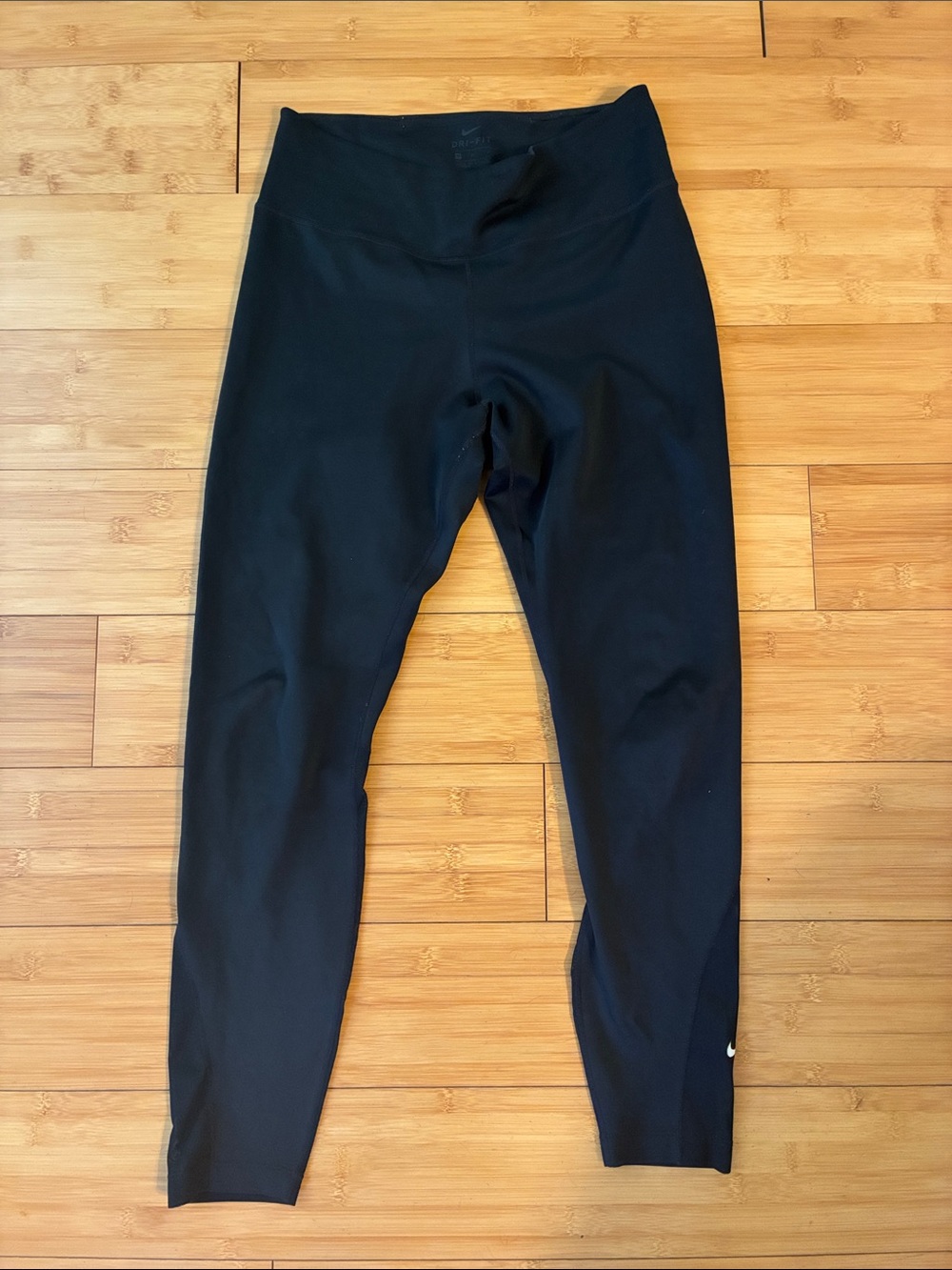 Nike Black High-Waist Performance Leggings with mesh detail